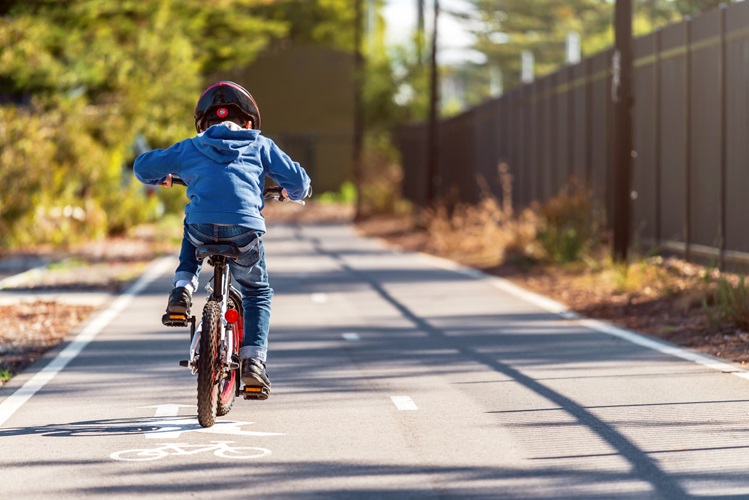 Australian,Boy,Riding,His,Bicycle,On,Bike,Lane,On,A