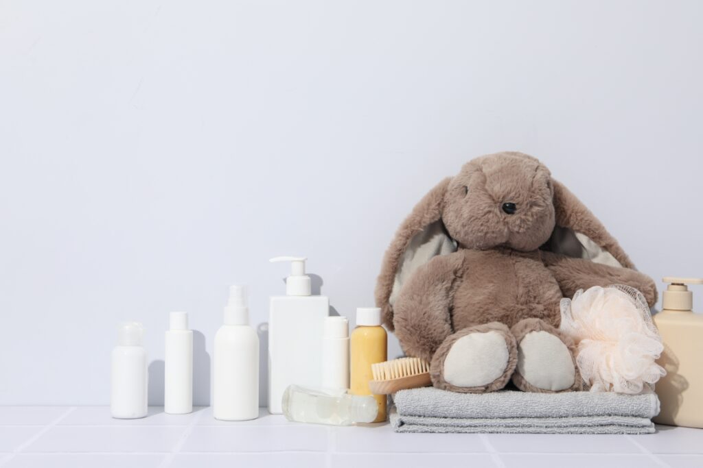 Concept of child bodycare, child cosmetic, space for text