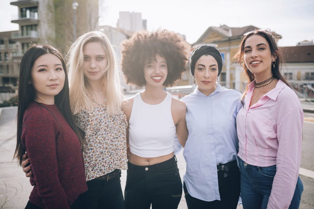 Portrait of friends in street, Milan, Italy