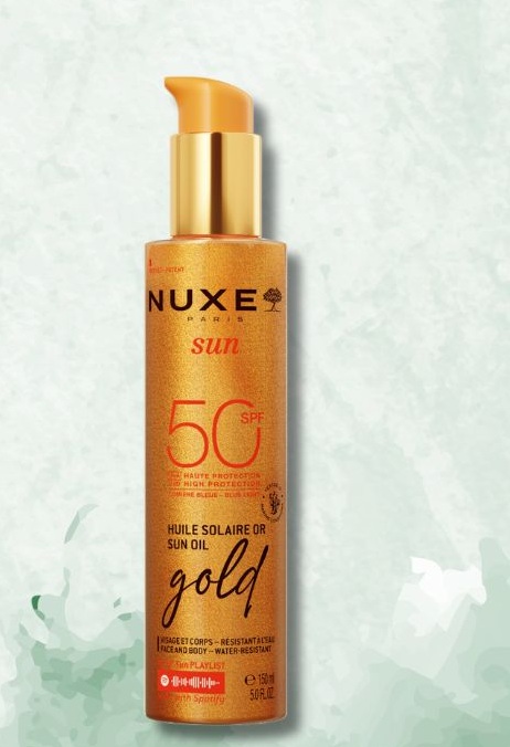 NUXE SUN Rozświetlający olejek z drobinkami do opalania twarzy i ciała SPF 50, 114 zł/150 ml
